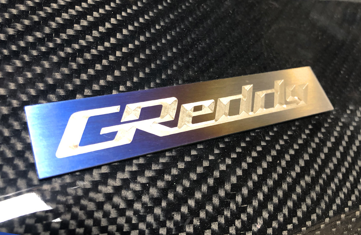 Optional Titanium GReddy Emblem - (105x20mm)