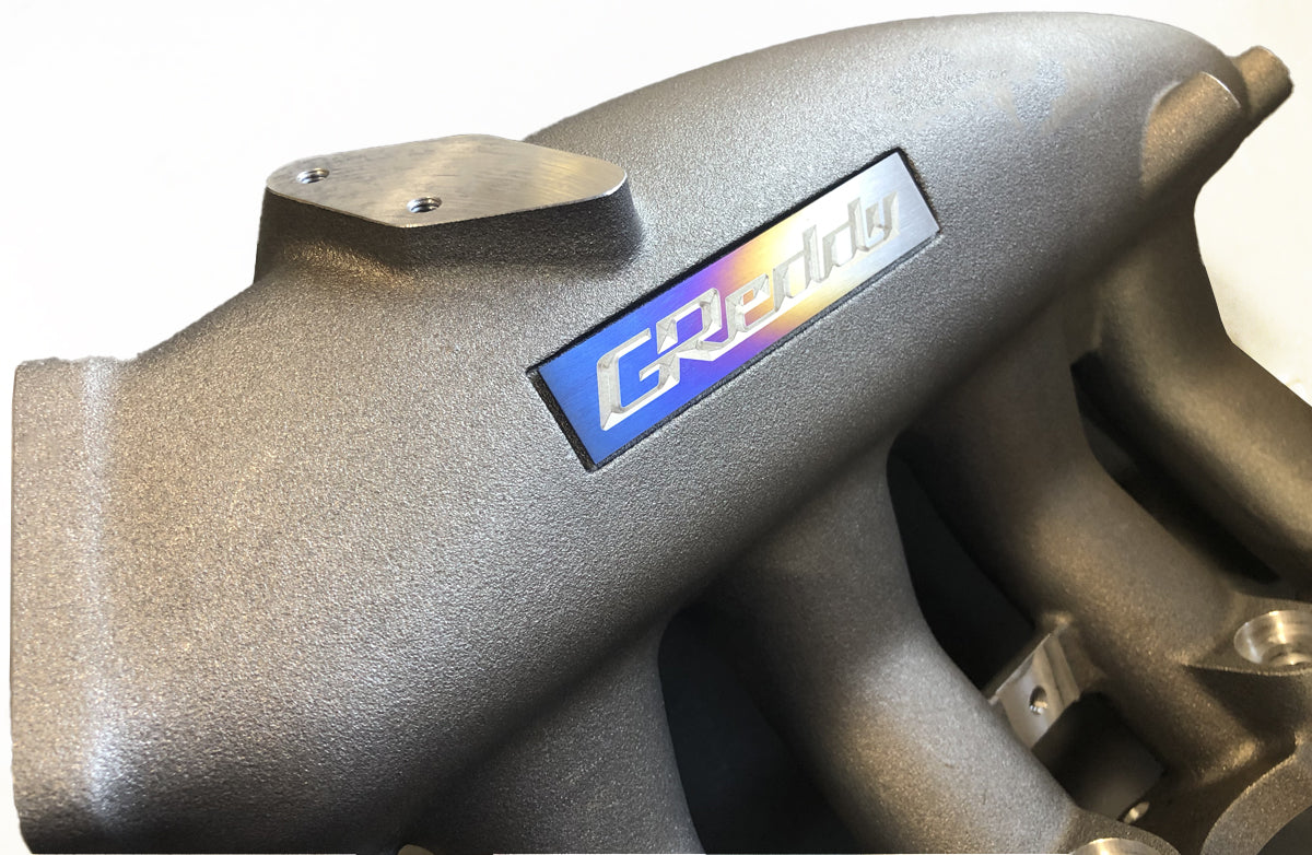 Optional Titanium GReddy Emblem - (105x20mm)