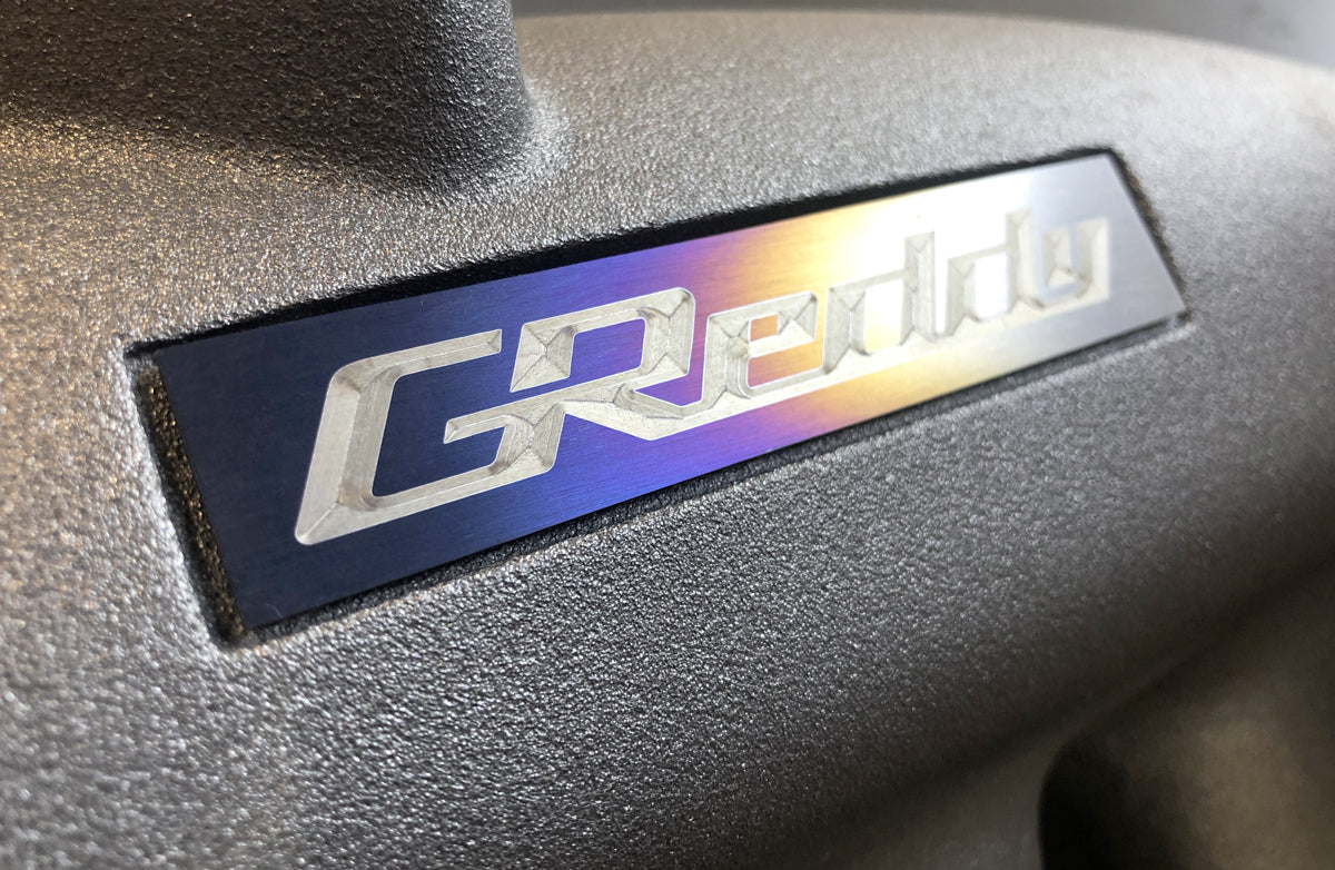 Optional Titanium GReddy Emblem - (105x20mm)